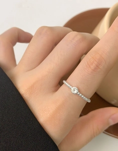 Close-up of S925 sterling silver beaded ring featuring a sparkling zircon stone