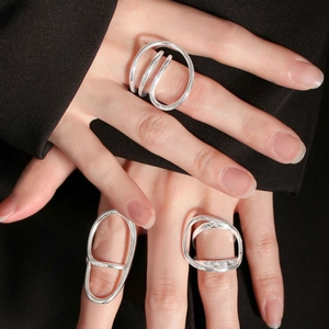 Three-piece minimalist S925 sterling silver geometric ring set worn on hand