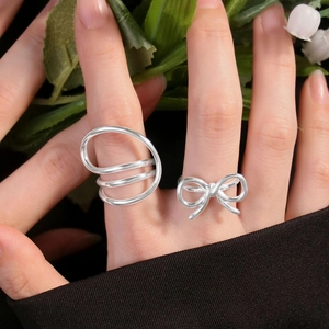 S925 sterling silver ring set featuring geometric circles and elegant bow design for women