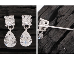 Macro shot of S925 sterling silver stamp and pear-cut zircon stones on drop earrings