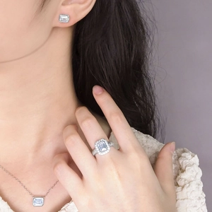 Elegant S925 silver jewelry set featuring emerald-cut cubic zirconia and twisted texture