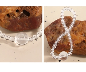 Gros plan d'un bracelet en perles de cristal poli avec noyau en argent S925 et pierres