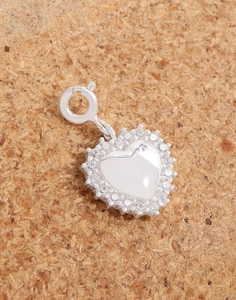 Macro view of S925 sterling silver heart pendant with shimmering cubic zirconia inlay