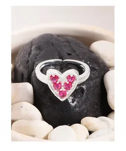 Detailed shot of S925 silver adjustable ring featuring a pink zircon heart frame