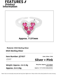 Macro shot of S925 sterling silver ring with five pink heart-shaped cubic zirconia stones