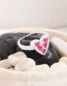 Detailed shot of an adjustable S925 silver ring featuring a pink heart-shaped zircon
