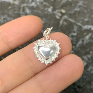 S925 sterling silver double-layered heart pendant with cubic zirconia on black stone