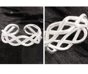Macro shot showing the S925 sterling silver hallmark on the woven Celtic knot ring