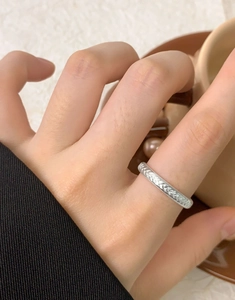 Detail view of woven texture on S925 sterling silver open ring for a vintage style