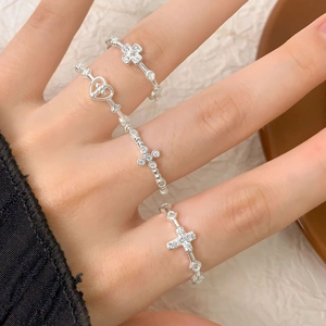 S925 silver heart and cross ring set with zircon stones on model's hand