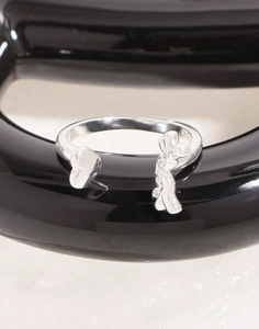 Macro shot of S925 sterling silver ring showing the hallmarked interior and irregular design