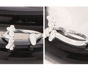 Detail of S925 sterling silver heart ring showing the hallmark and wing design