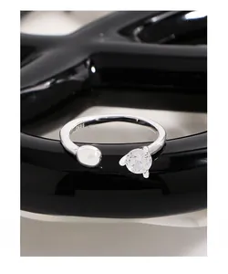 Macro view of S925 sterling silver ring showing the hallmark and zirconia stone inlay
