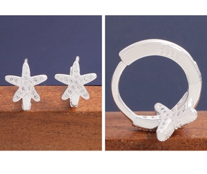 Detail shot of S925 sterling silver starfish earrings with cubic zirconia and hallmark