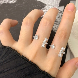 S925 sterling silver heart and star adjustable ring set worn on hand with knitted cuff