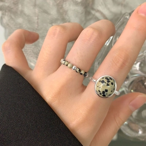 Natural spotted stone S925 sterling silver minimalist rings worn on female model's hand