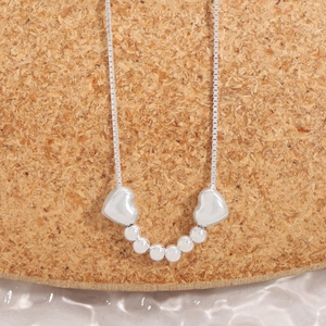 Elegante Halskette aus S925 Sterlingsilber mit Herzanhängern und kleiner Boxkette
