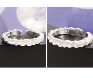Detailed macro view of S925 sterling silver twist ring with inner purity hallmark