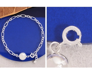 Detailed close-up of S925 sterling silver ball chain bracelet with 925 hallmark stamp