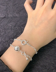 Detailed close-up of S925 sterling silver ball chain bracelet set with OT toggle clasp
