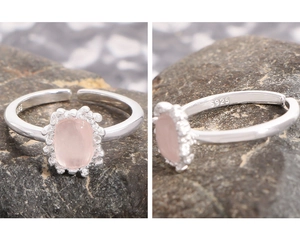 Detailed macro view of S925 sterling silver ring with rectangular pink crystal and retro edge