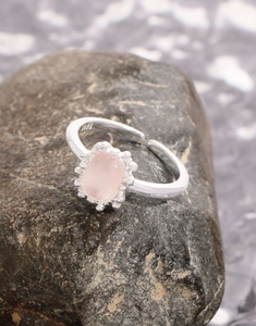 Macro shot of S925 sterling silver ring showing the inner S925 hallmark and pink crystal