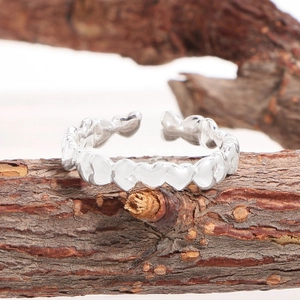 Minimalist S925 sterling silver open heart ring with irregular design on wooden branch