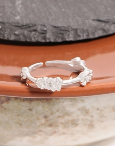 Detailed view of S925 sterling silver adjustable ring with delicate flower cluster design