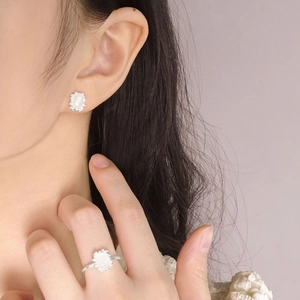 Elegant S925 sterling silver set featuring pink crystal ring and matching stud earrings