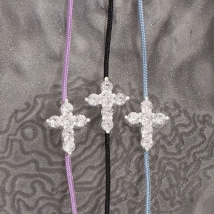 Three-piece set of woven cross bracelets with sparkling cubic zirconia in purple black and blue