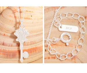 Detail of S925 sterling silver stamp on the shell key necklace clasp and wavy chain