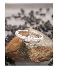 Detailed close-up of S925 sterling silver star ring with engraved patterns on stone