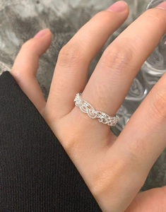 Detailed view of an S925 sterling silver lace crown ring featuring white zircon stones