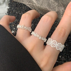 Elegant S925 sterling silver lace rings with zircon details worn on hand