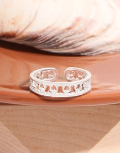 Detail shot of adjustable S925 sterling silver ring with hollow heart-shaped patterns