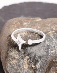 Macro detail of S925 sterling silver star ring with zircon inlay and 925 hallmark