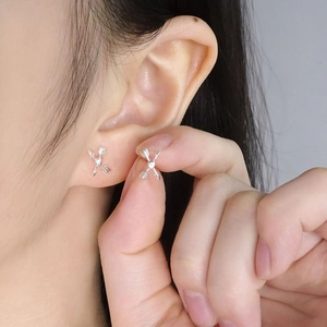 Elegant S925 sterling silver cupid arrow stud earrings for women with minimalist design