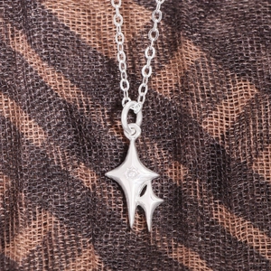Elegant S925 sterling silver double starburst pendant necklace with zircon stone