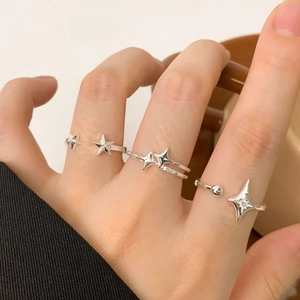S925 sterling silver star ring set with zircon accents worn by model on hand