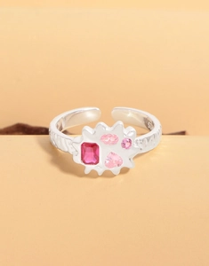 Macro view of S925 sterling silver ring featuring colorful zircon stones and lava texture