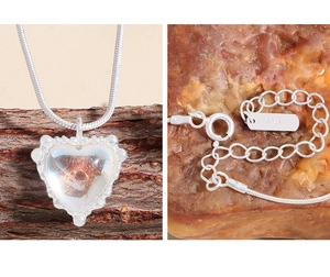 Detailed view of S925 sterling silver stamp and snake chain clasp with moonstone heart