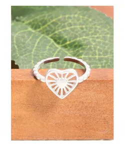 Macro detail showing S925 sterling silver stamp and radial lines on hollow heart ring