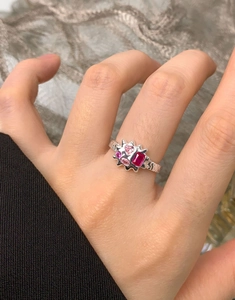 Detailed shot of S925 silver lava texture ring featuring red and pink zircon gemstones