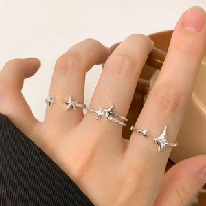 Minimalist S925 sterling silver star rings with zircon stones shown on hand