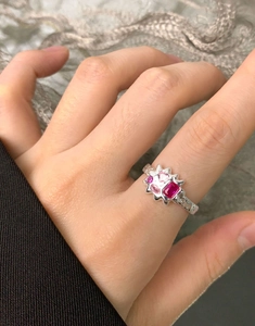 Detail of S925 silver lava texture ring with red rectangle and pink heart zircon stones