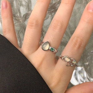 S925 sterling silver rings set with pear-shaped moonstone and opal in a minimalist design
