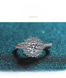 Macro shot of S925 silver sunflower moissanite wedding ring with sparkling halo detail