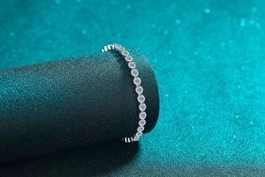 Close-up of S925 sterling silver bubble tennis bracelet with sparkling moissanite stones