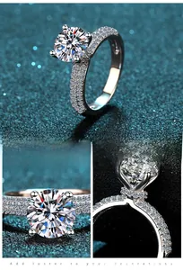 Macro detail of a 2-carat round brilliant cut moissanite ring with side stones in s925 silver