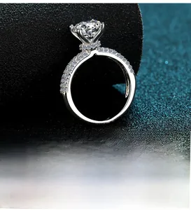 Macro shot of 2 carat round moissanite ring with classic six-prong setting in S925 silver